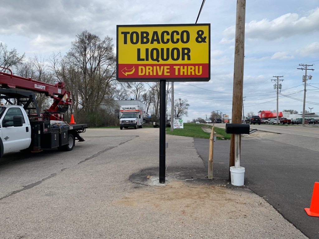 Tobacco Liquor Pole Sign